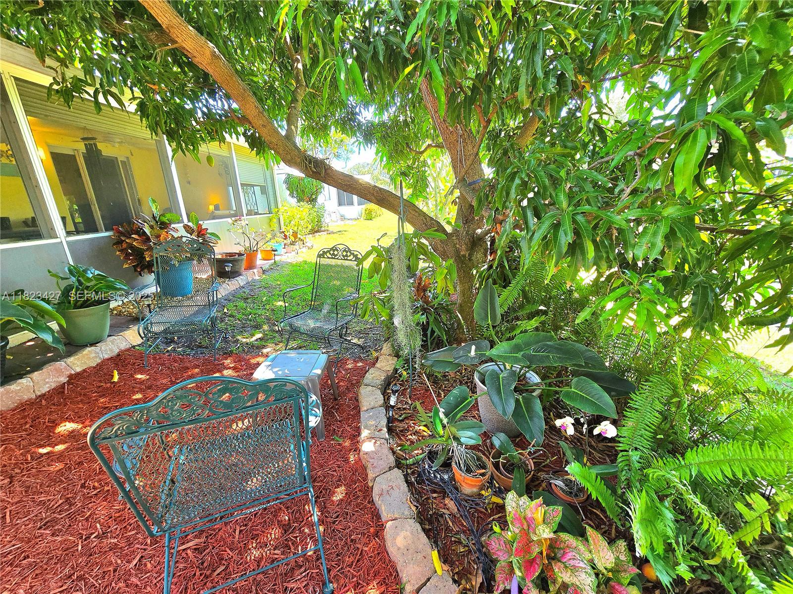 1711 Southwest 22nd Street Boynton Beach, FL 33426 - Photo 29 of 60 Sit outside