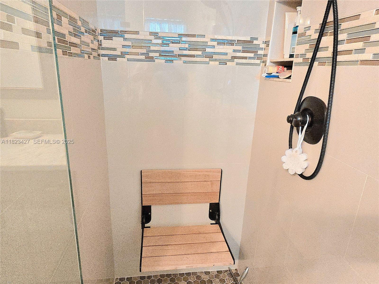 1711 Southwest 22nd Street Boynton Beach, FL 33426 - Photo 44 of 60 a bathroom with a shower