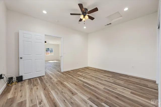 a bathroom with a toilet and a bathtub