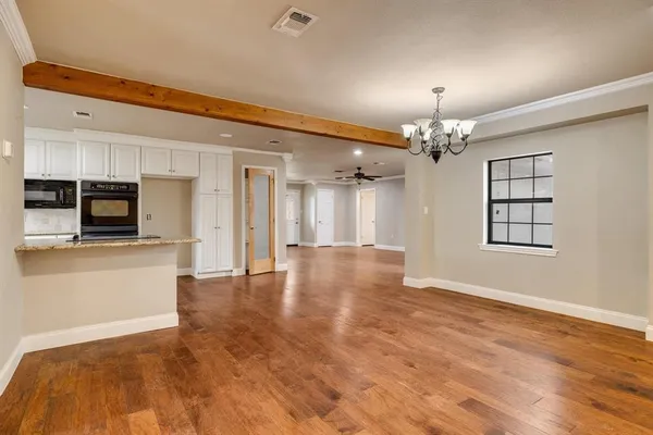 a view of a livingroom with a flat screen tv