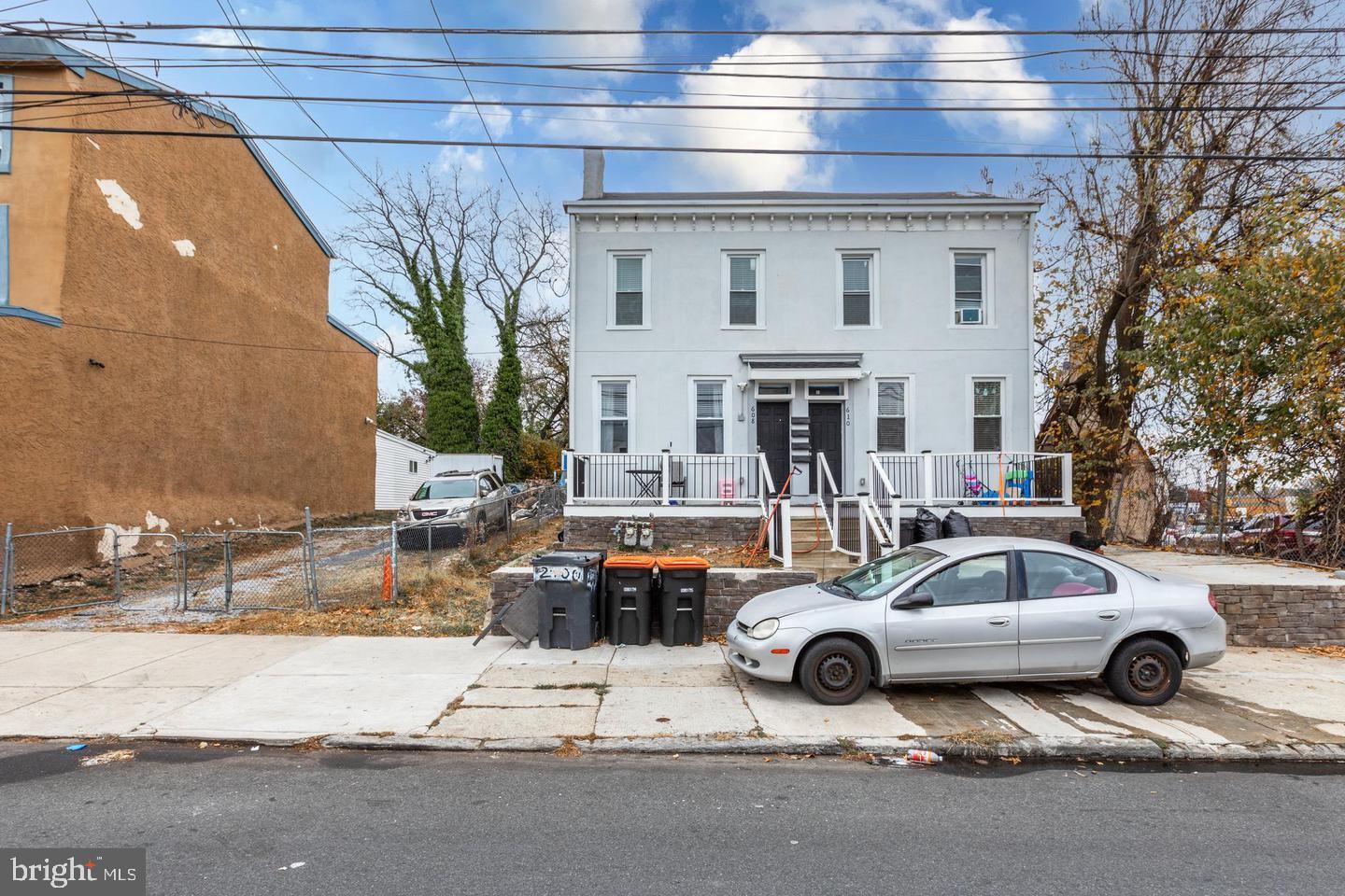 a car parked in front of a house