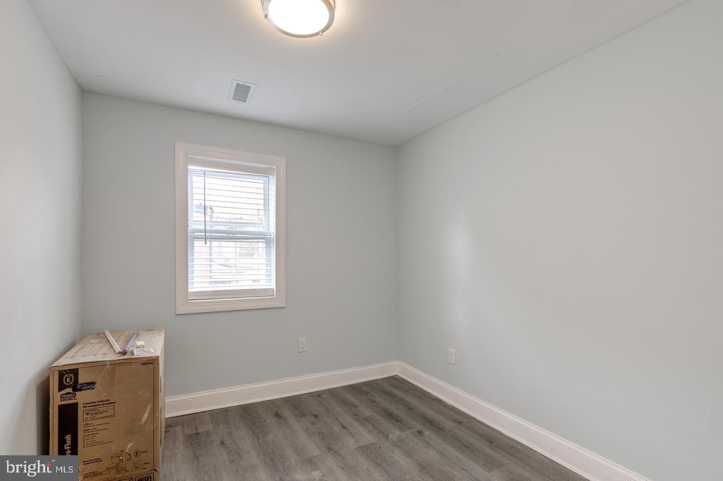 608 9th Street, Unit 2 Chester, PA 19013 - Photo 11 of 13 an empty room with a window