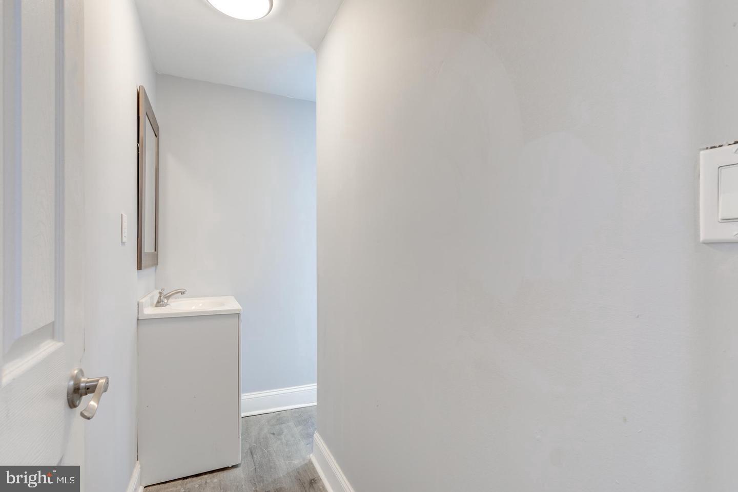 608 9th Street, Unit 2 Chester, PA 19013 - Photo 4 of 13 a bathroom with a sink