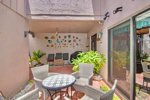 a spacious bedroom with a bed and a window