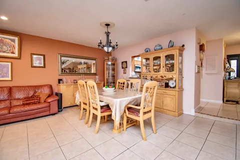 a view of walk in closet with clothes