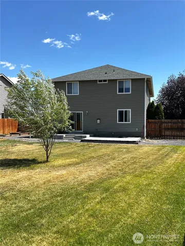 a view of a house with swimming pool