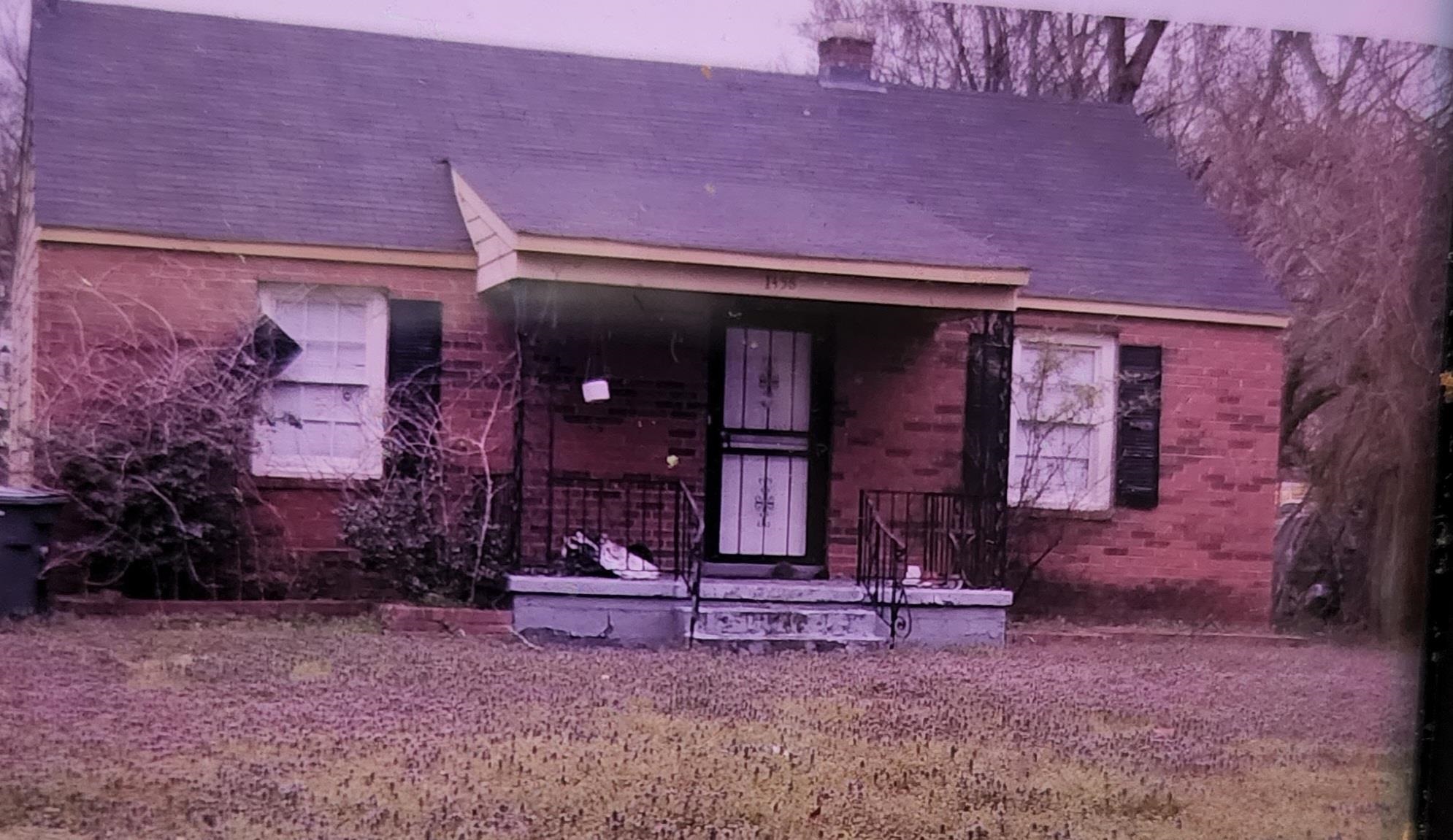 1456 Rienel Street Memphis, TN 38111 - Photo 2 of 2 front view of a house with an empty space
