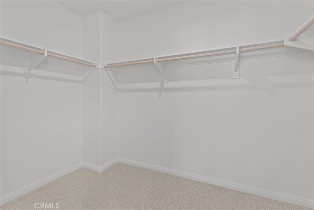 1249 Butterfly Way Banning, CA 92220 - Photo 15 of 18 a view of an empty walk in closet