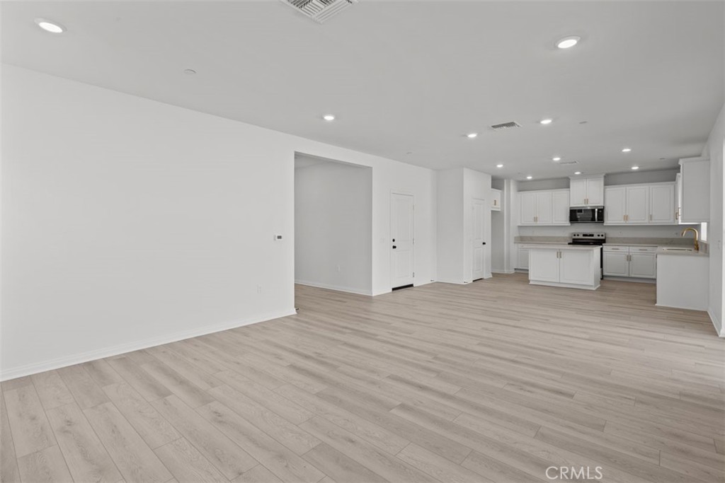1249 Butterfly Way Banning, CA 92220 - Photo 8 of 18 a view of kitchen with wooden floor