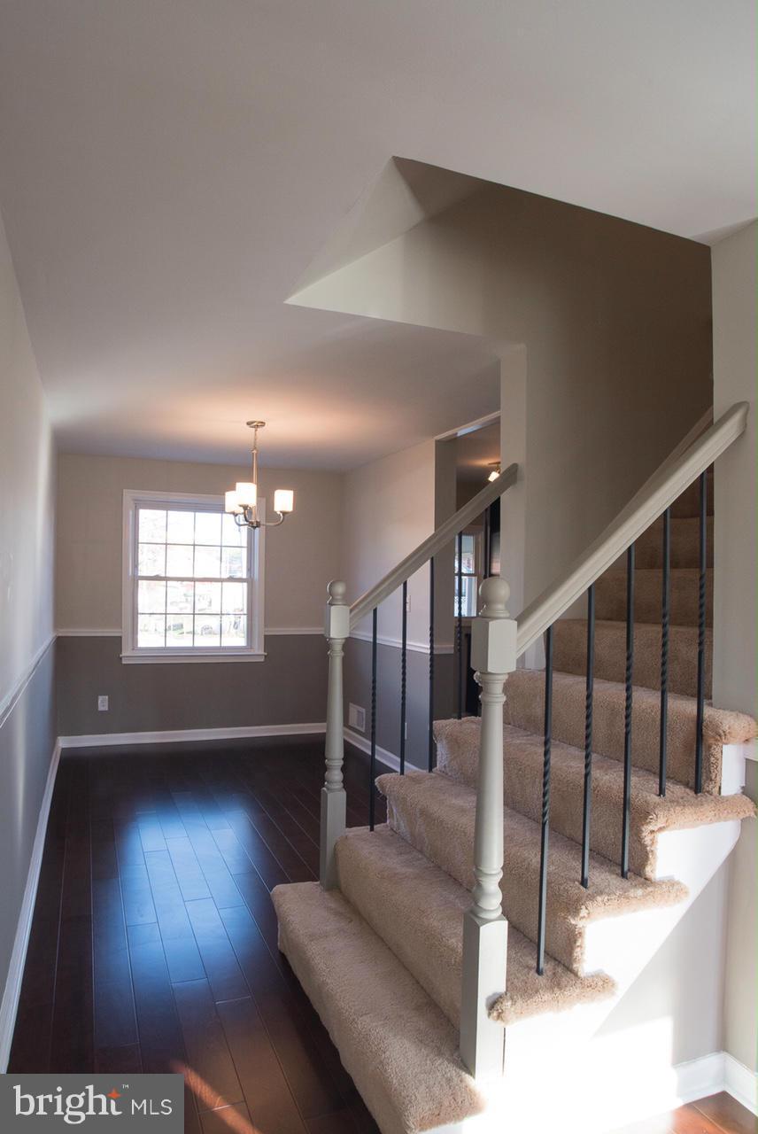 450 Torner Road Baltimore, MD 21221 - Photo 5 of 10 a view of entryway and hall with wooden floor