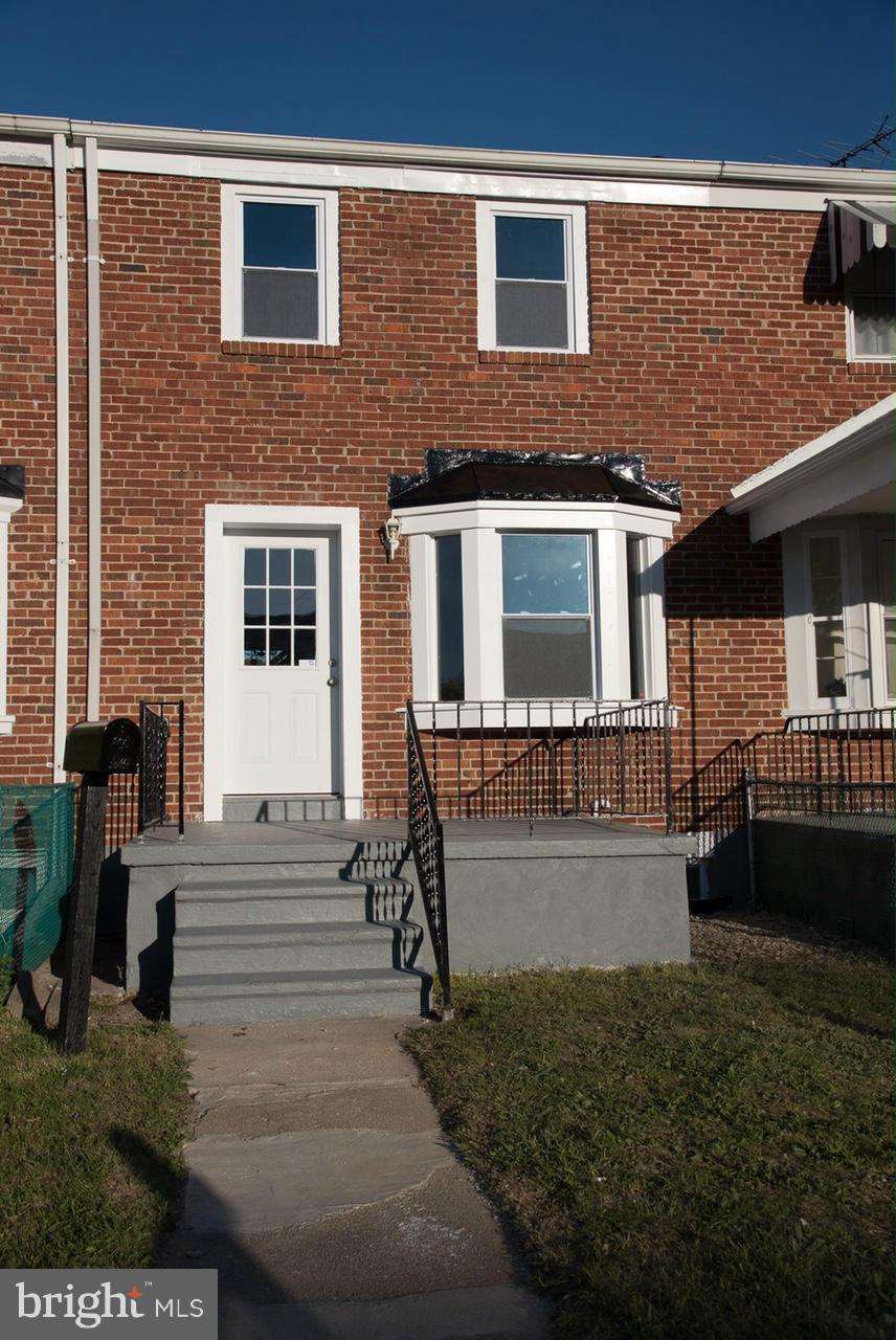 450 Torner Road Baltimore, MD 21221 - Photo 9 of 10 a front view of a house with a yard