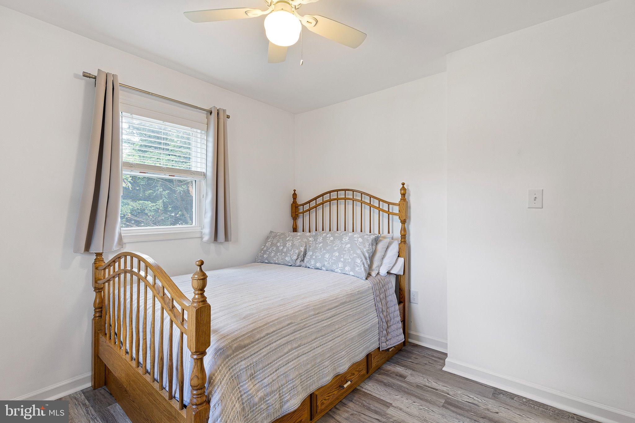 370 Big Elk Chapel Road Elkton, MD 21921 - Photo 17 of 29 a bedroom with a bed and a window