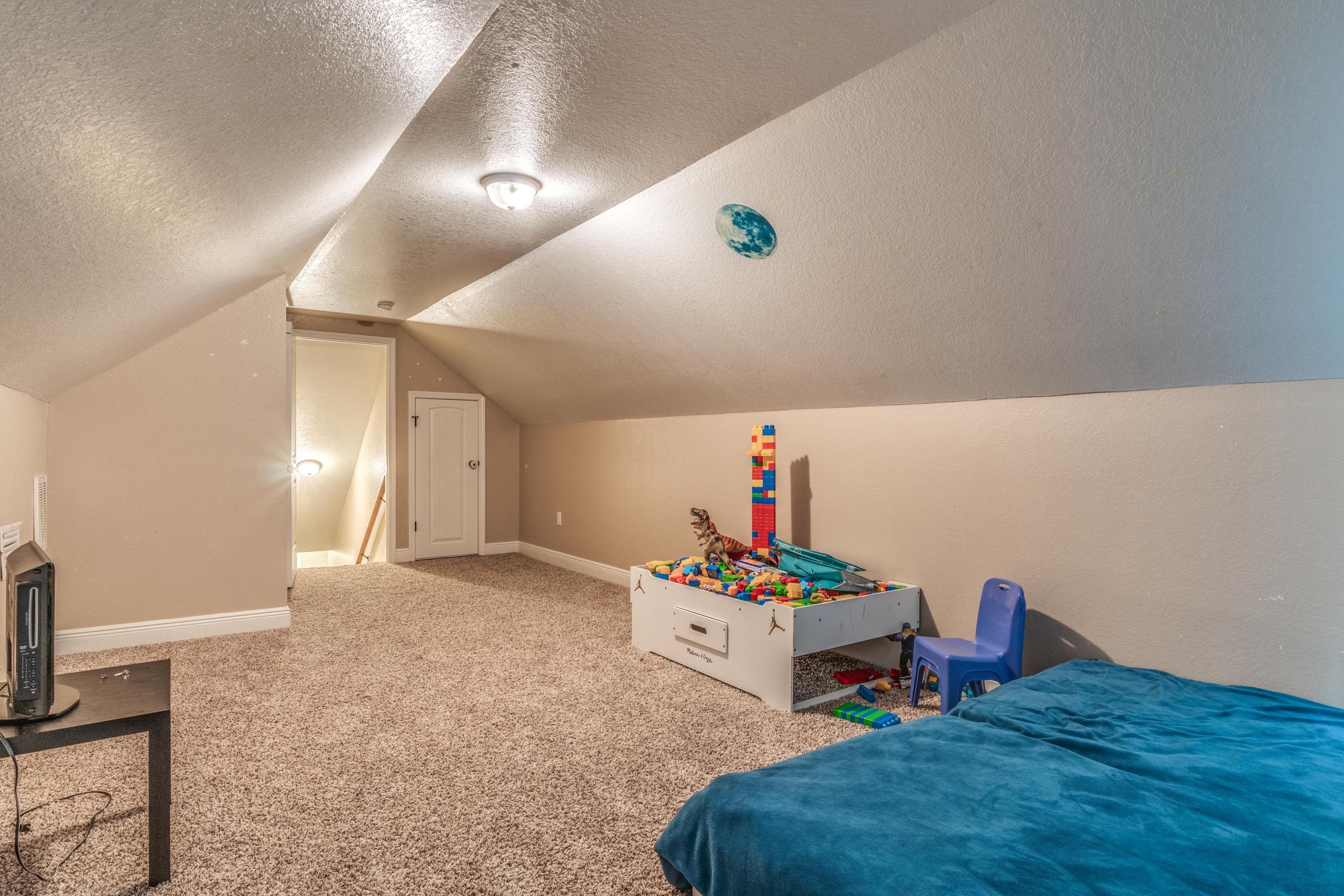 4005 Happy Trails Road Crestview, FL 32539 - Photo 20 of 24 a living room with furniture and a wooden floor