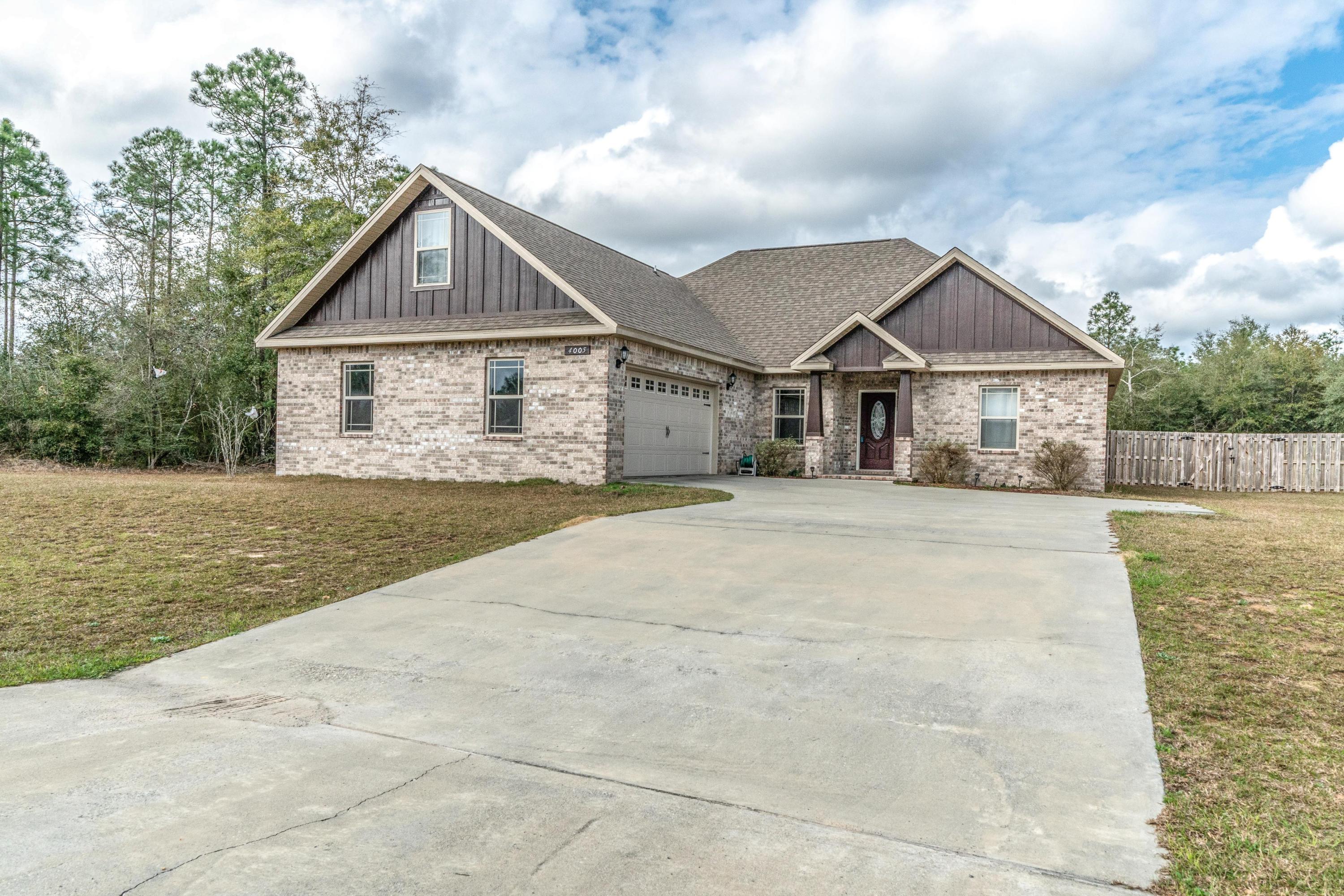 4005 Happy Trails Road Crestview, FL 32539 - Photo 24 of 24 a view of house with yard and entertaining space