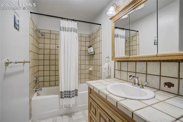 a bathroom with a sink and a bathtub