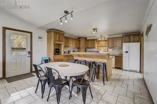 a view of a dining room with furniture