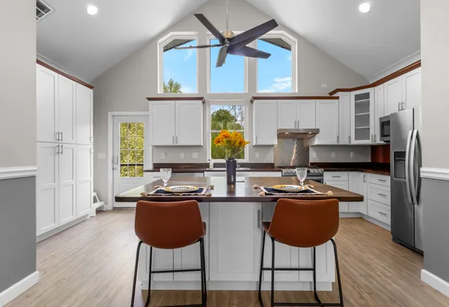 a backyard of a house with lots of green space