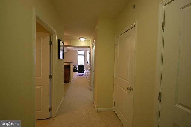 851 North Glebe Road, Unit 810 Arlington, VA 22203 - Photo 22 of 28 a view of a hallway with a living room