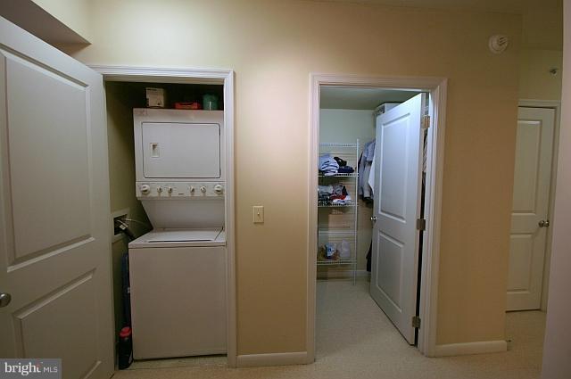 851 North Glebe Road, Unit 810 Arlington, VA 22203 - Photo 5 of 28 a utility room with dryer and washer