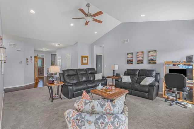 a living room with furniture and a couch
