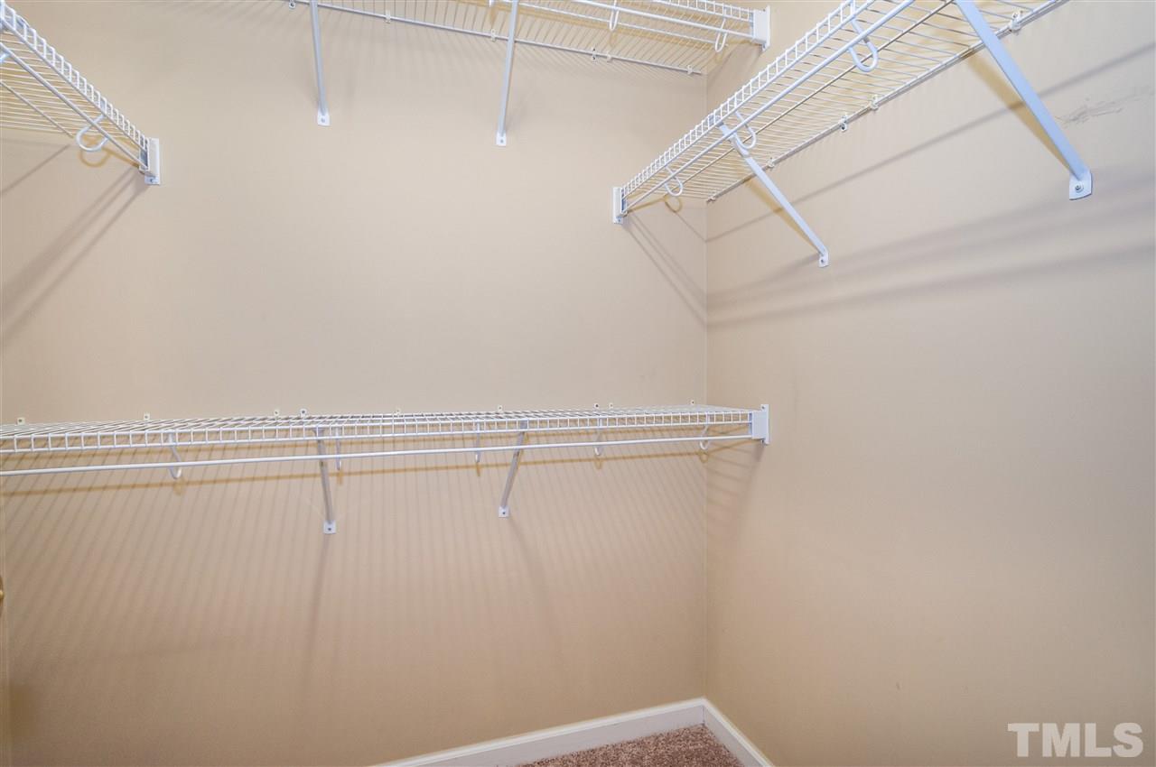 2301 Bay Harbor Drive Raleigh, NC 27604 - Photo 12 of 25 a view of a room with racks on the wall