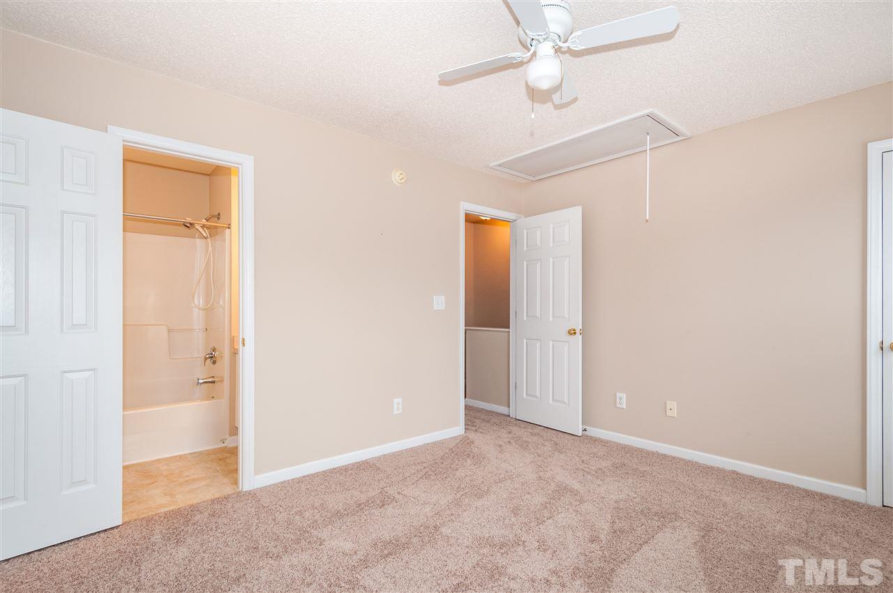 2301 Bay Harbor Drive Raleigh, NC 27604 - Photo 14 of 25 an empty room with closet and a ceiling fan