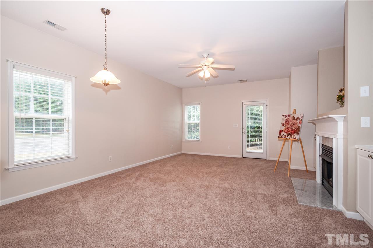 2301 Bay Harbor Drive Raleigh, NC 27604 - Photo 4 of 25 a view of an empty room with a window