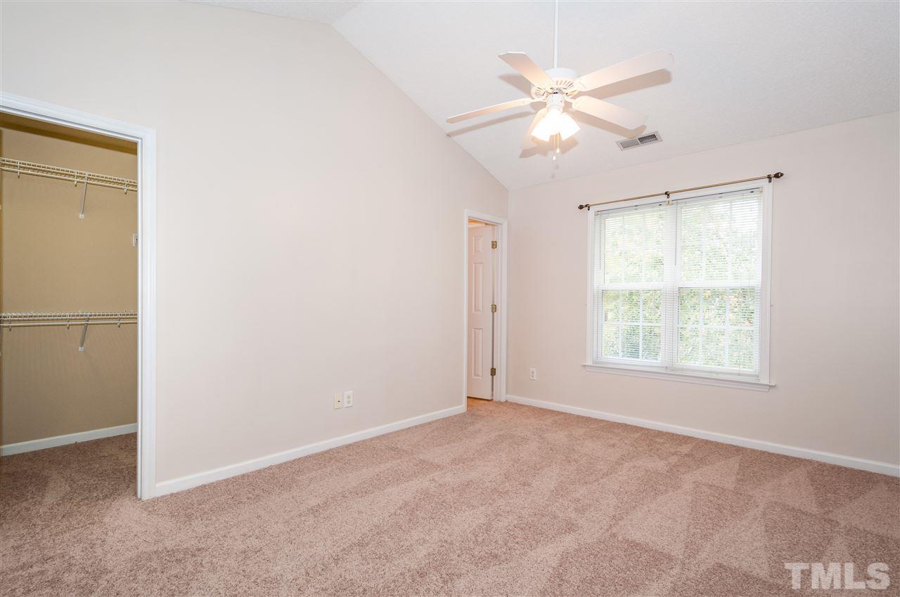 2301 Bay Harbor Drive Raleigh, NC 27604 - Photo 10 of 25 a view of an empty room with a window