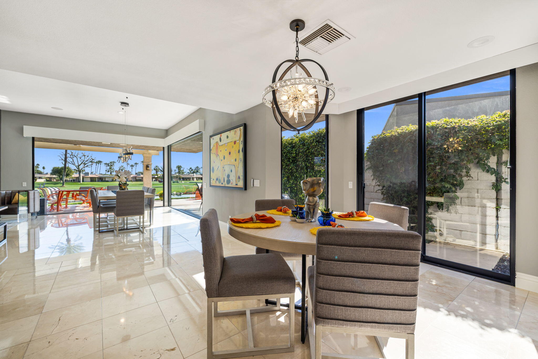 6 Barnard Court Rancho Mirage, CA 92270 - Photo 16 of 58 a outdoor space with furniture and view of garden