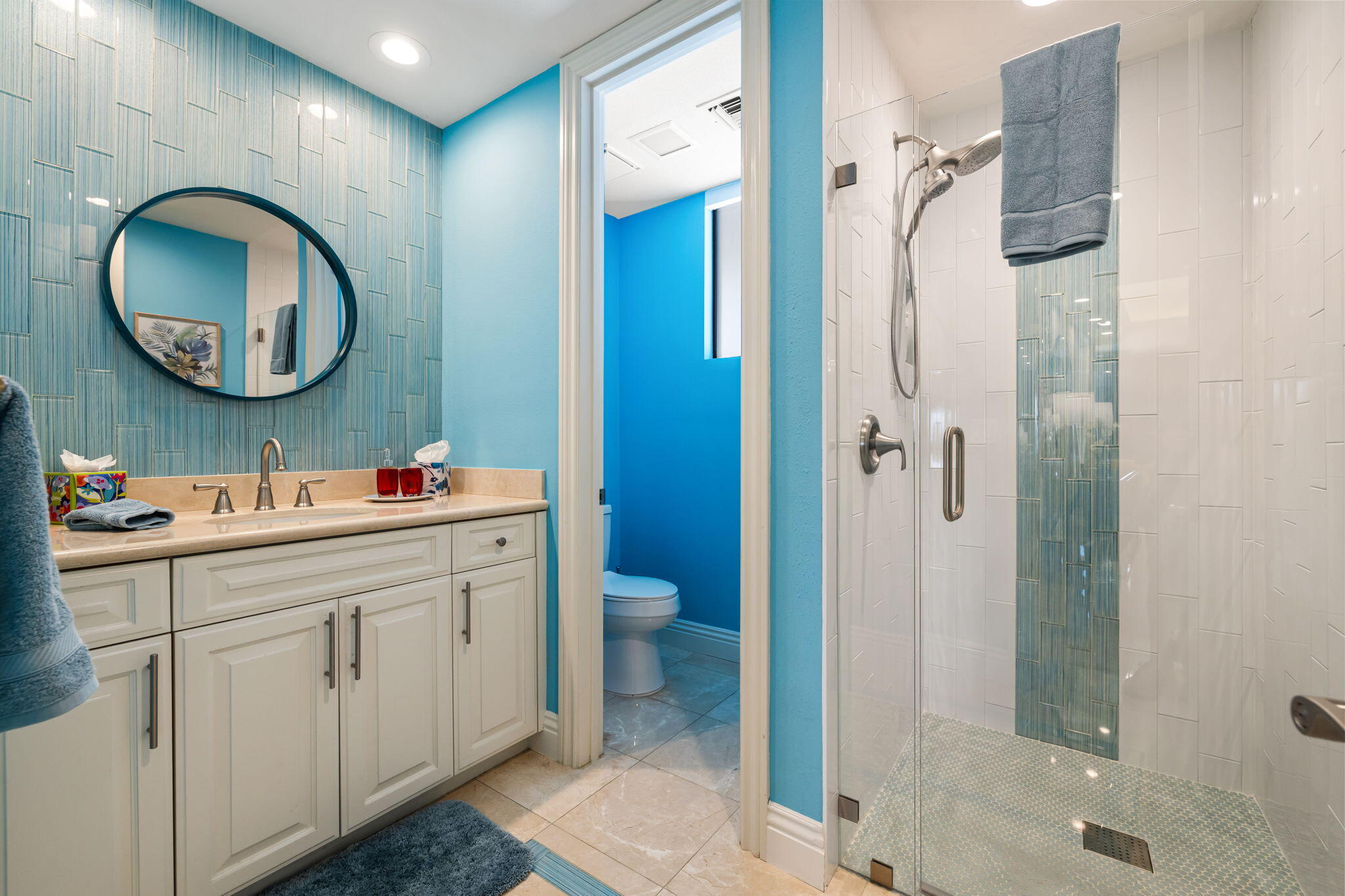 6 Barnard Court Rancho Mirage, CA 92270 - Photo 25 of 58 a bathroom with a double vanity sink and a mirror