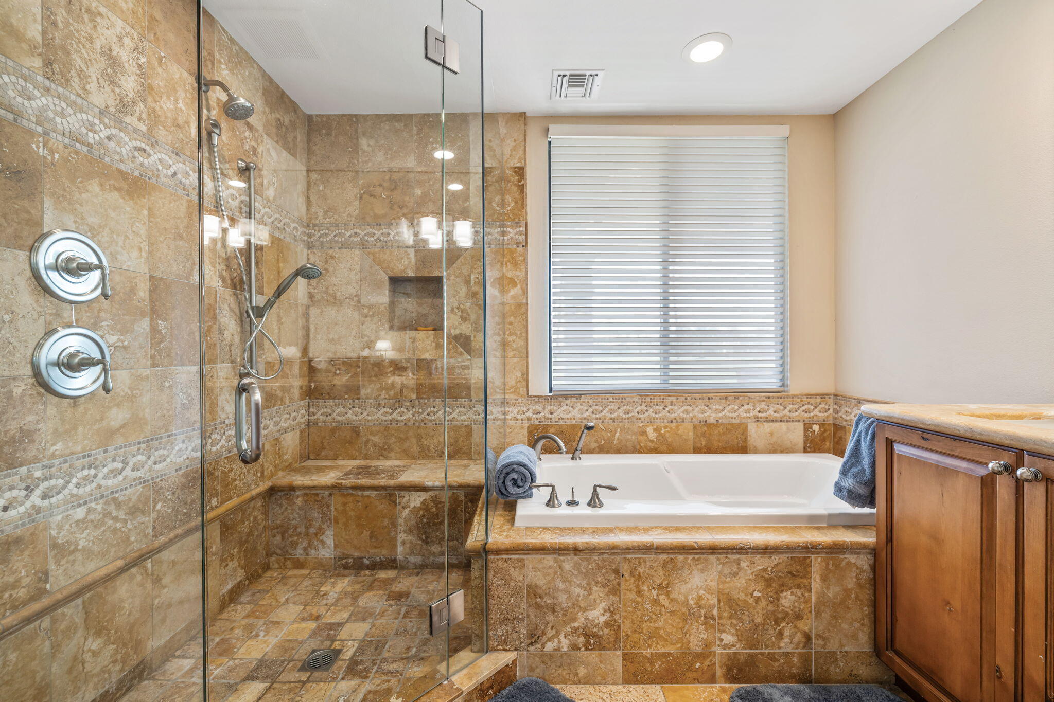 6 Barnard Court Rancho Mirage, CA 92270 - Photo 31 of 58 a bathroom with a tub a sink and shower
