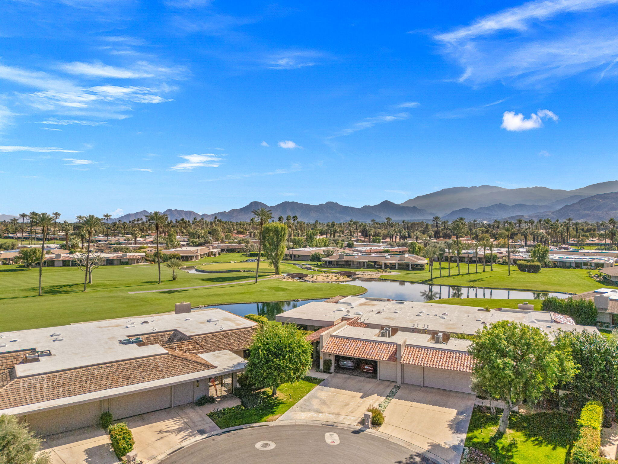 6 Barnard Court Rancho Mirage, CA 92270 - Photo 46 of 58 a view of swimming pool and lake view