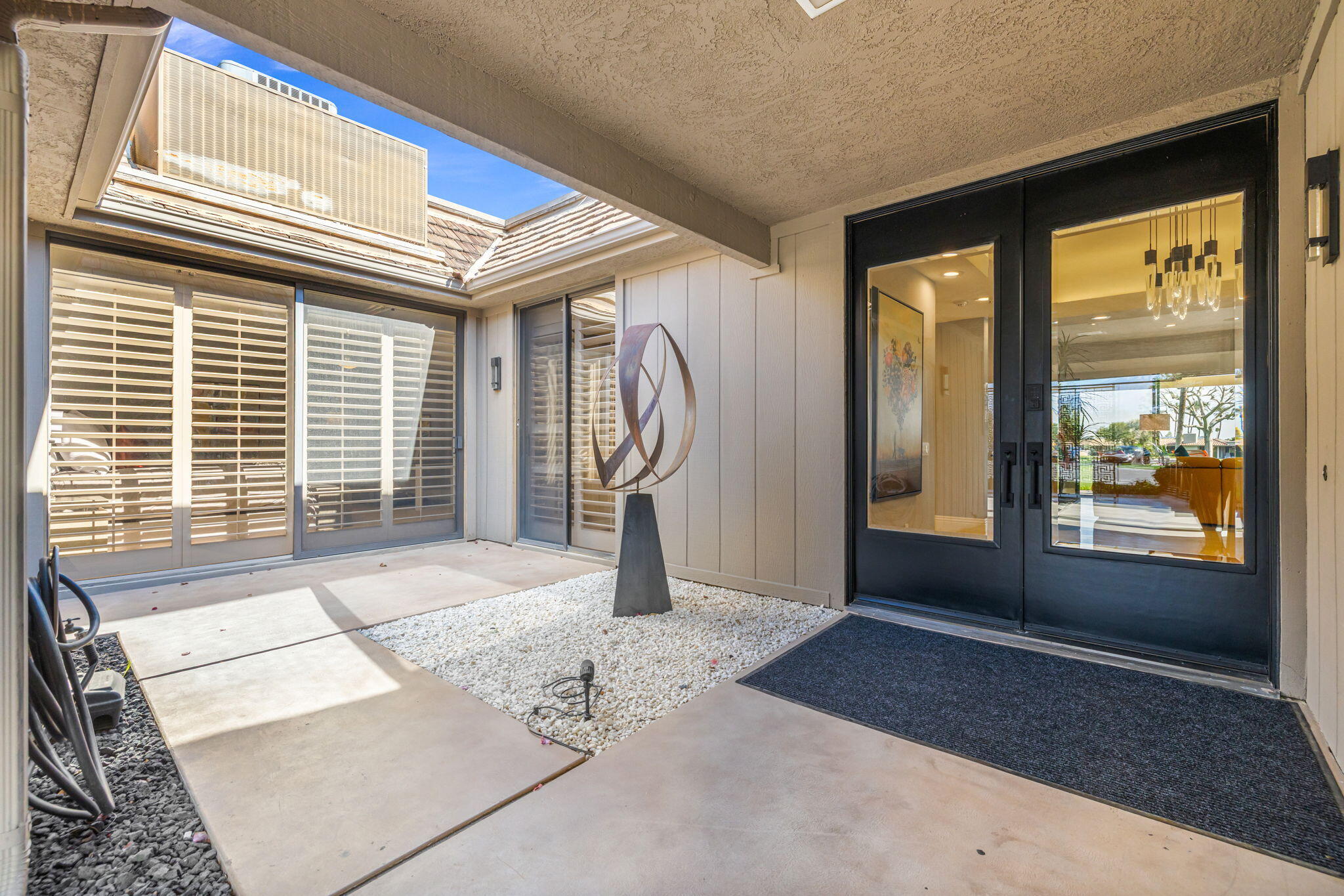 6 Barnard Court Rancho Mirage, CA 92270 - Photo 50 of 58 a view of an entryway