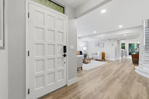 wooden floor and white doors
