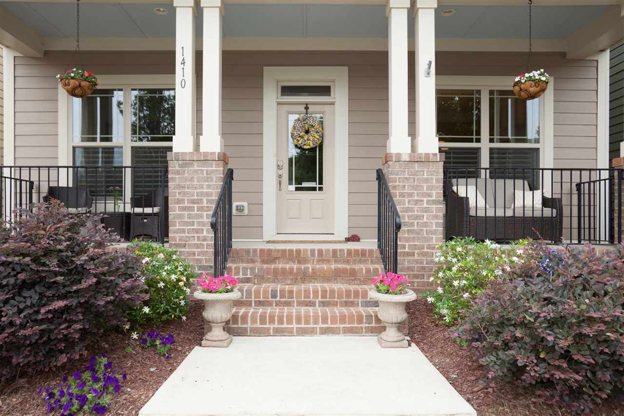 FRONT PORCH IS SPACIOUS AND GREAT FOR ROCKING CHAIRS AND ENTERTAINING! Front Exterior