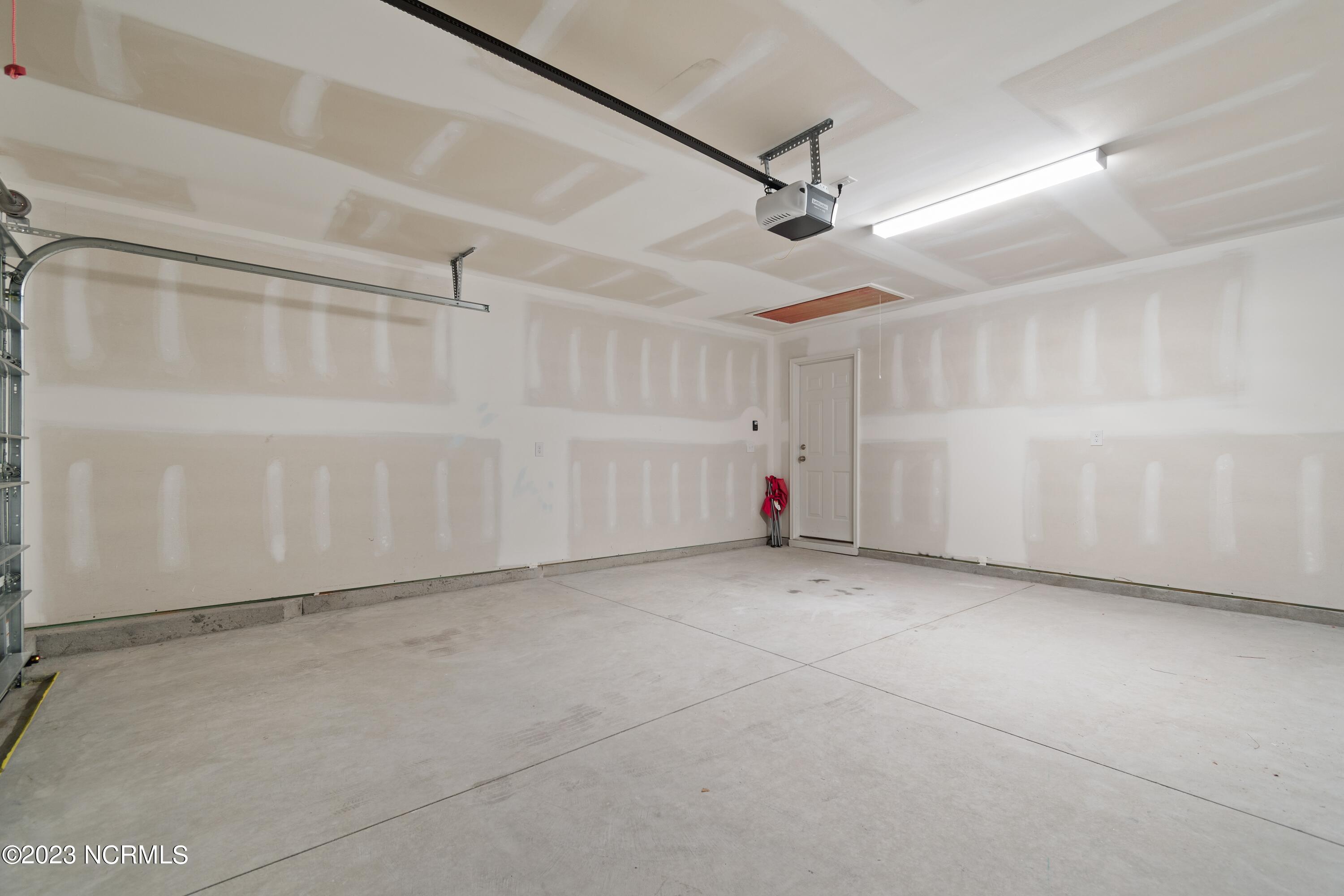 860 Village Point Road Southwest Shallotte, NC 28470 - Photo 23 of 28 Spacious Garage