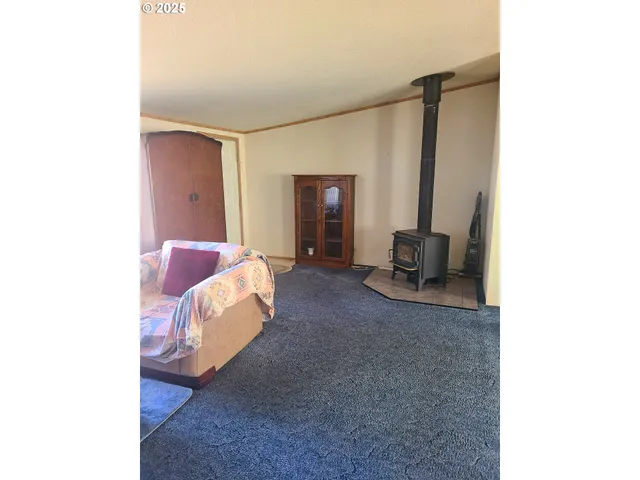 a bed room with a bed and a mirror