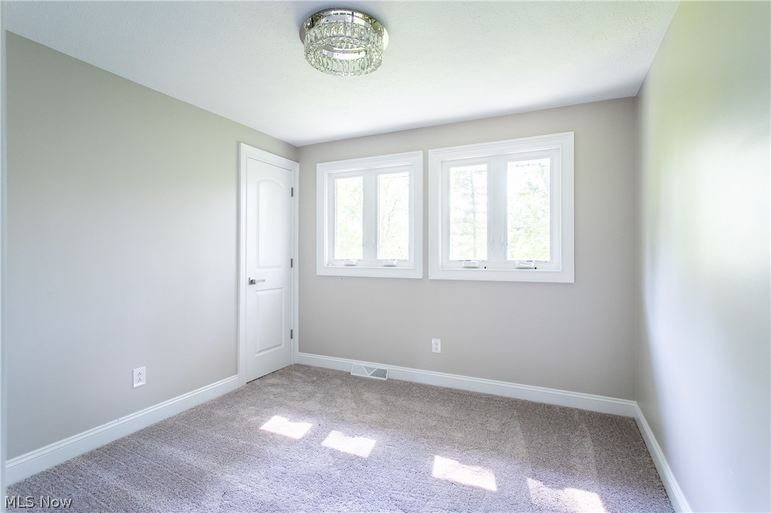 2728 Lander Road Cleveland, OH 44124 - Photo 33 of 50 Unfurnished room with carpet flooring