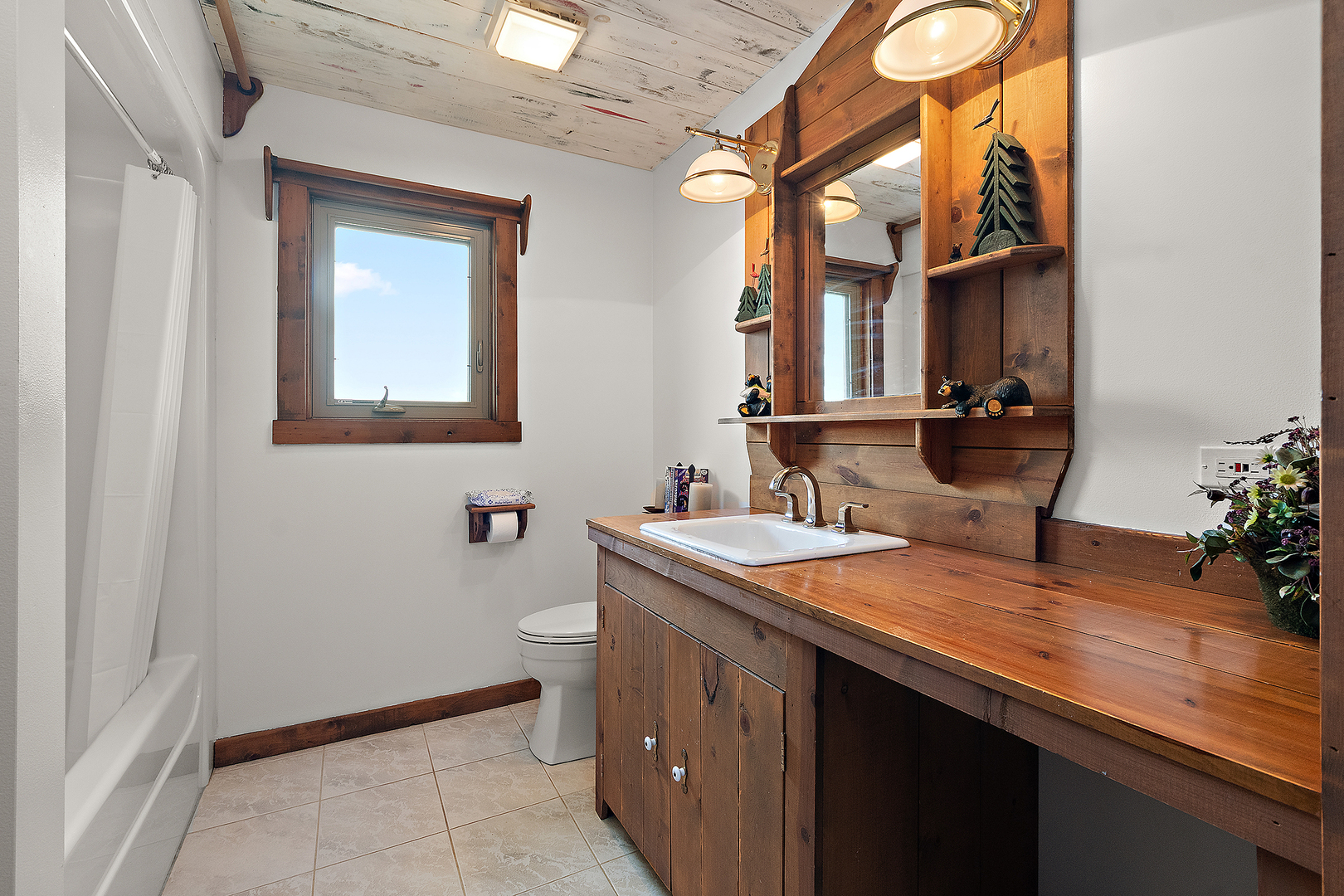 7860 West Steger Road Frankfort, IL 60423 - Photo 38 of 56 a bathroom with a granite countertop sink a toilet and mirror
