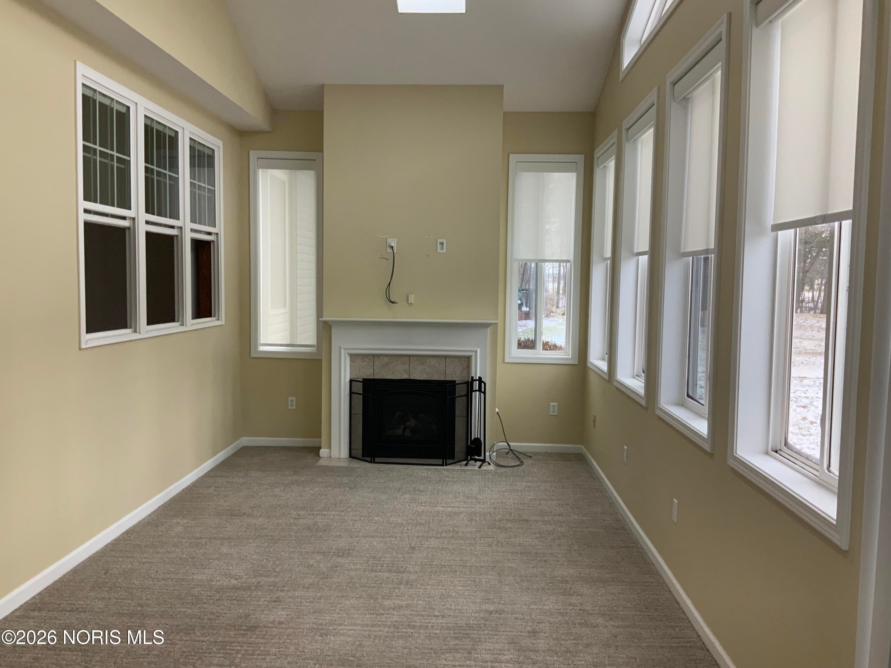 109 Rivers Edge Lane, Unit C Upper Sandusky, OH 43351 - Photo 38 of 54 4 Season Room w/Fireplace