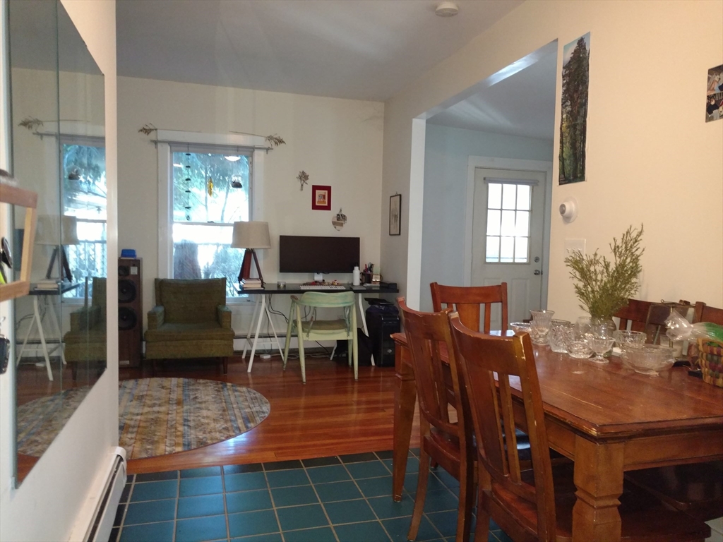 26 Hingham Street, Unit 2 Cambridge, MA 02138 - Photo 1 of 11 a view of a dining room with furniture