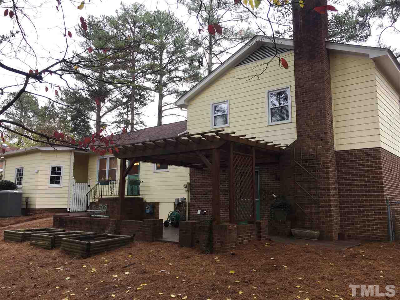 505 East Millbrook Road Raleigh, NC 27609 - Photo 18 of 25 a front view of a house