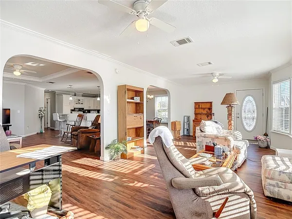 a workspace with furniture hardwood and a window