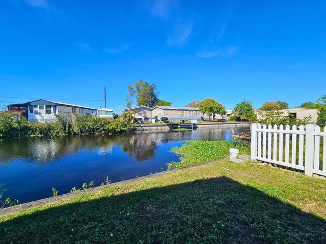 a view of a lake with houses