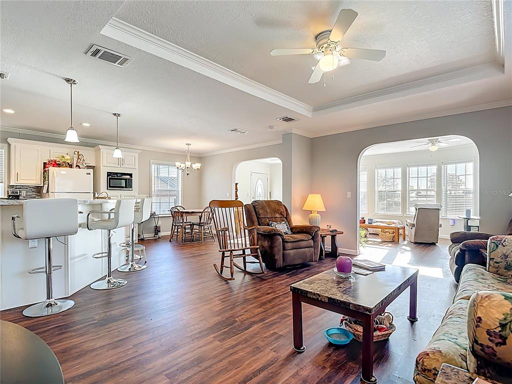 1824 Riverside Drive Moore Haven, FL 33471 - Photo 32 of 66 a living room with furniture and wooden floor
