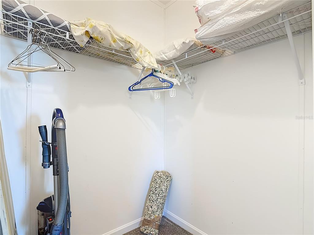 1824 Riverside Drive Moore Haven, FL 33471 - Photo 42 of 66 a view of a room with rack on the wall