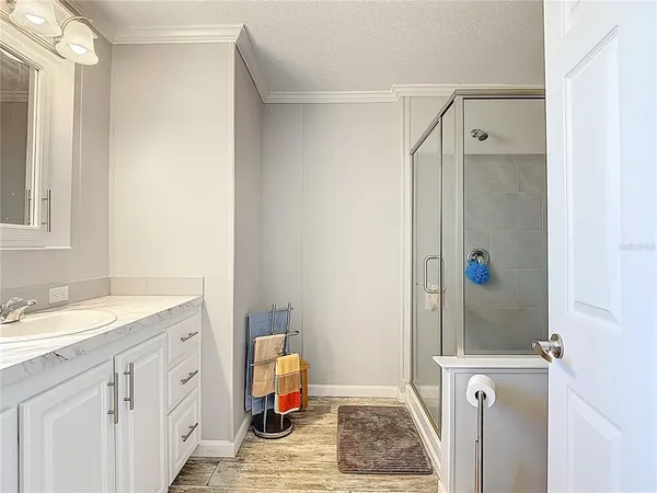 an aerial view of a house with a garden