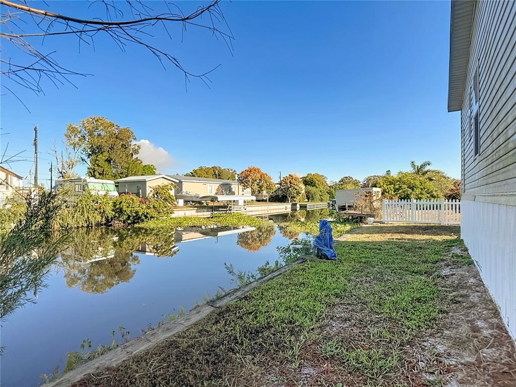 1824 Riverside Drive Moore Haven, FL 33471 - Photo 50 of 66 a view of a lake with houses