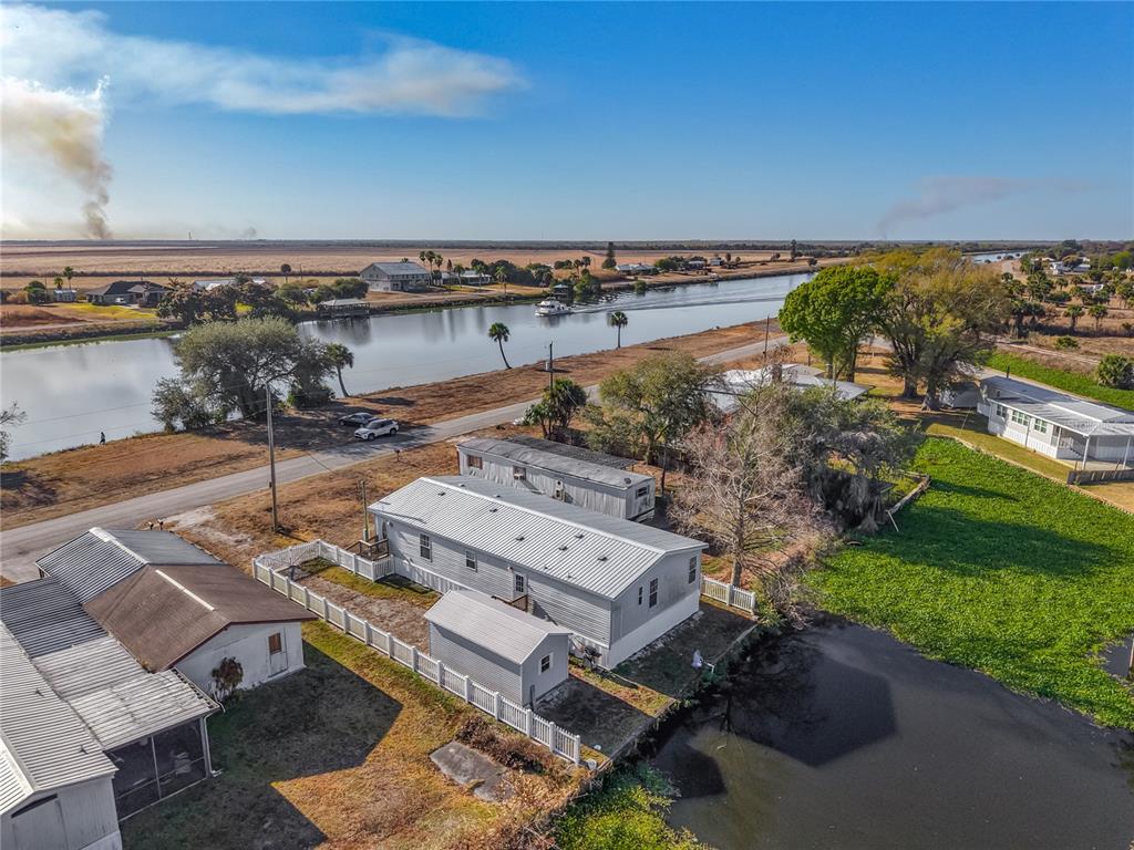 1824 Riverside Drive Moore Haven, FL 33471 - Photo 60 of 66 an aerial view of a house with a garden