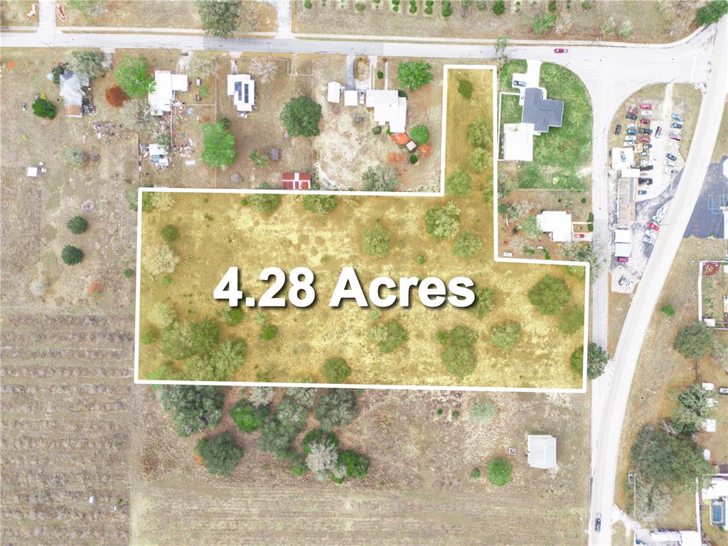 9th Street West Frostproof, FL 33843 - Photo 3 of 12 a view of a painting on a wall